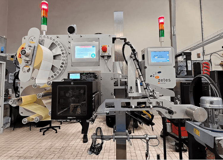 Zetes - ZetesAtlas
ZetesAtlas, a packaging execution system that generates, prints and camera-verifies unique identifiers at high line speeds. Its track record in EU Falsified Medicines Directive serialisation proves the model: unit-level IDs aggregated across cases and pallets, with a clean audit trail back to the line. The same stack is now being redeployed for consumer packaging.