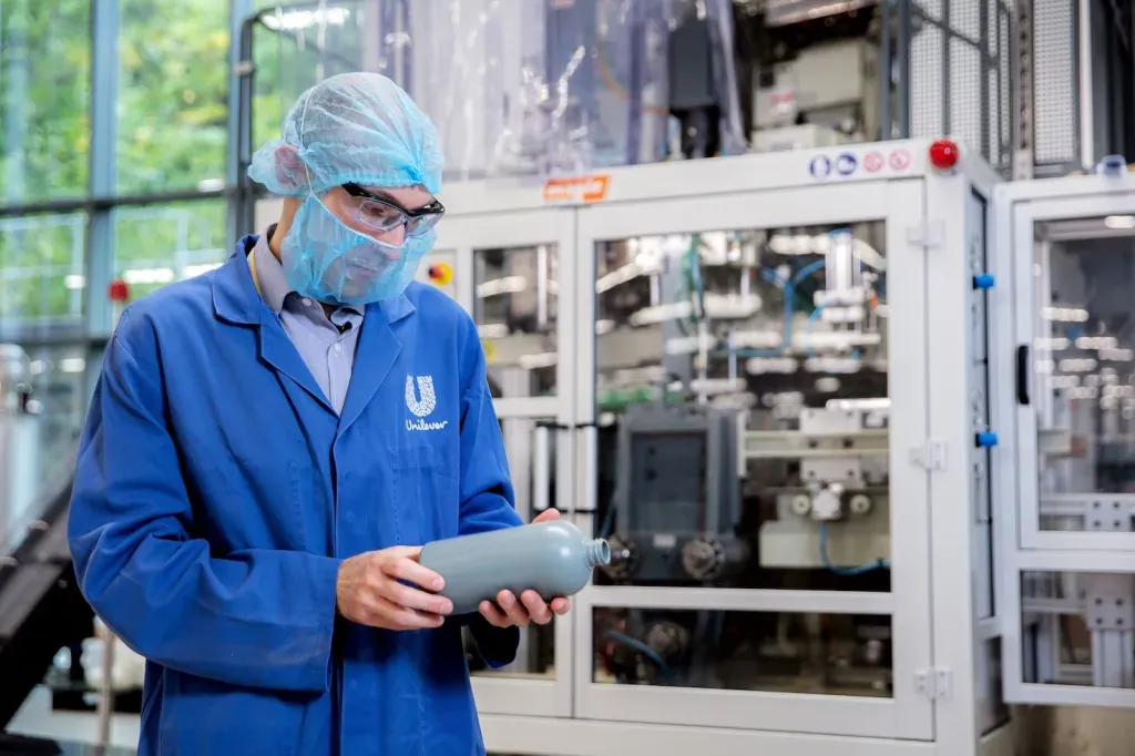 A Unilever packaging team member tests recycled plastic at the company's Advanced Manufacturing Center in Port Sunlight in the U.K.