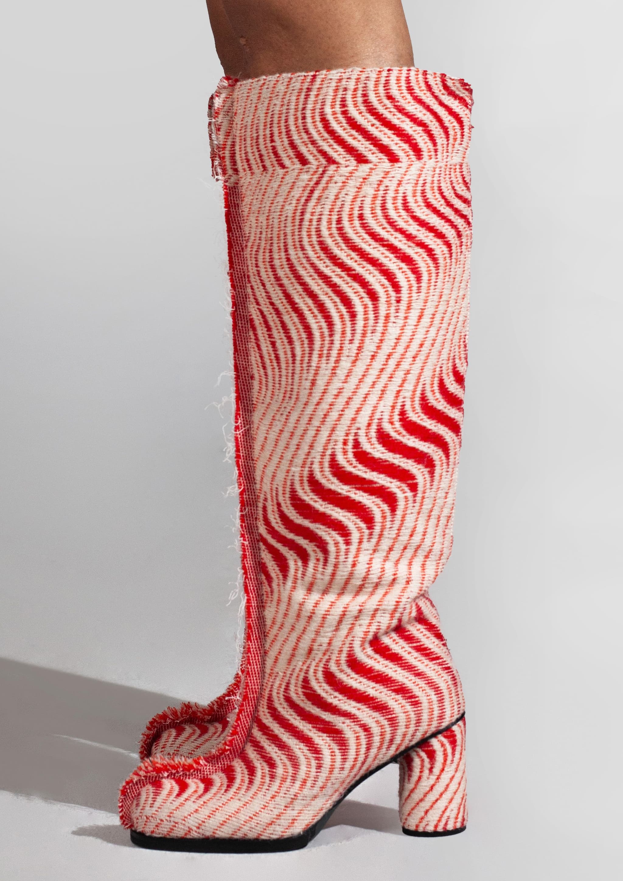 3D woven boots with a flame inspired pattern in local Swedish wool from the spinning and scouring mill Ullkontoret in Sweden.