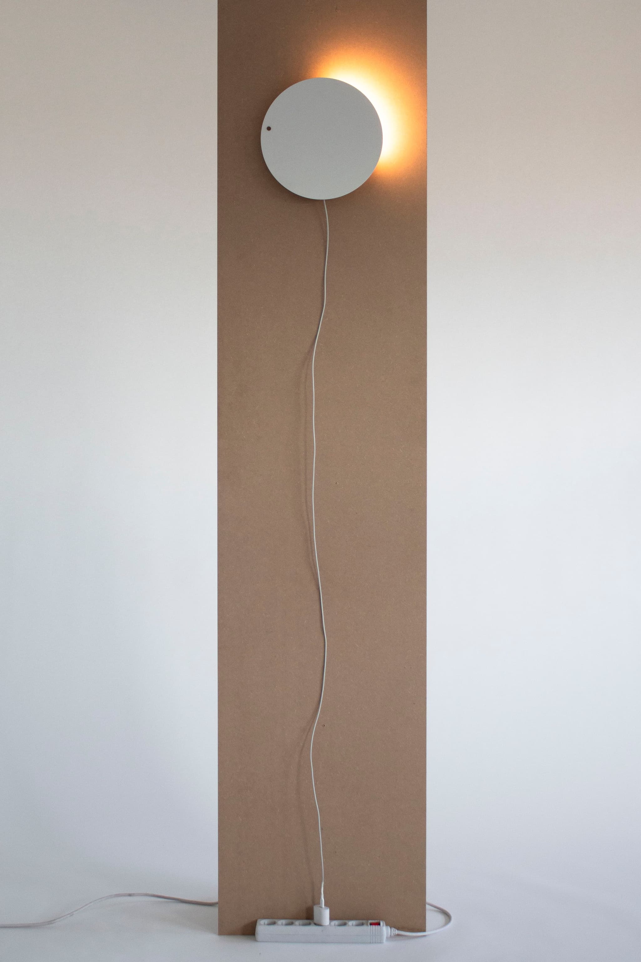 360° series has adjustable light control by placing a finger inside a circular recess on the edge (as if dialing on an old telephone)