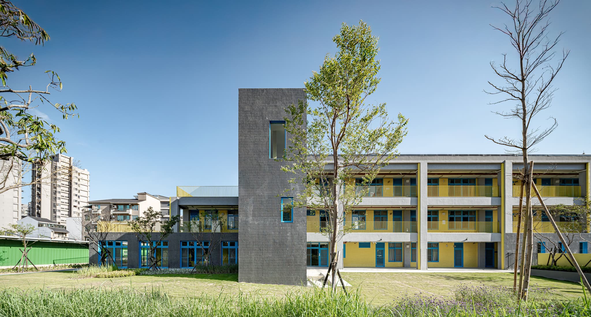 Bade Primary School backyard, doubling as a playground and stormwater retention garden.
Picture by OS Studio