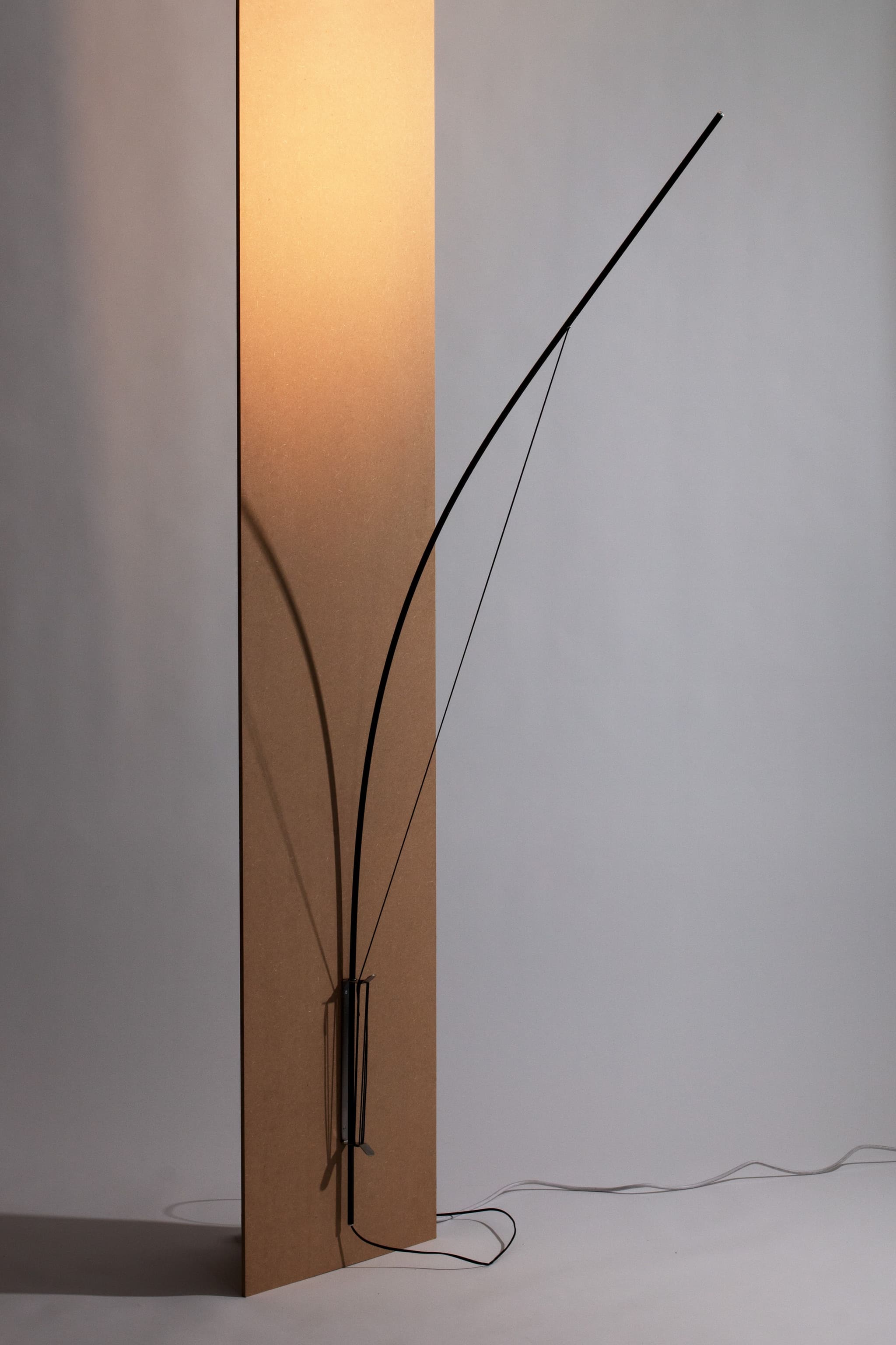 BOW luminaire draws inspiration from tents for its spatial aesthetic.