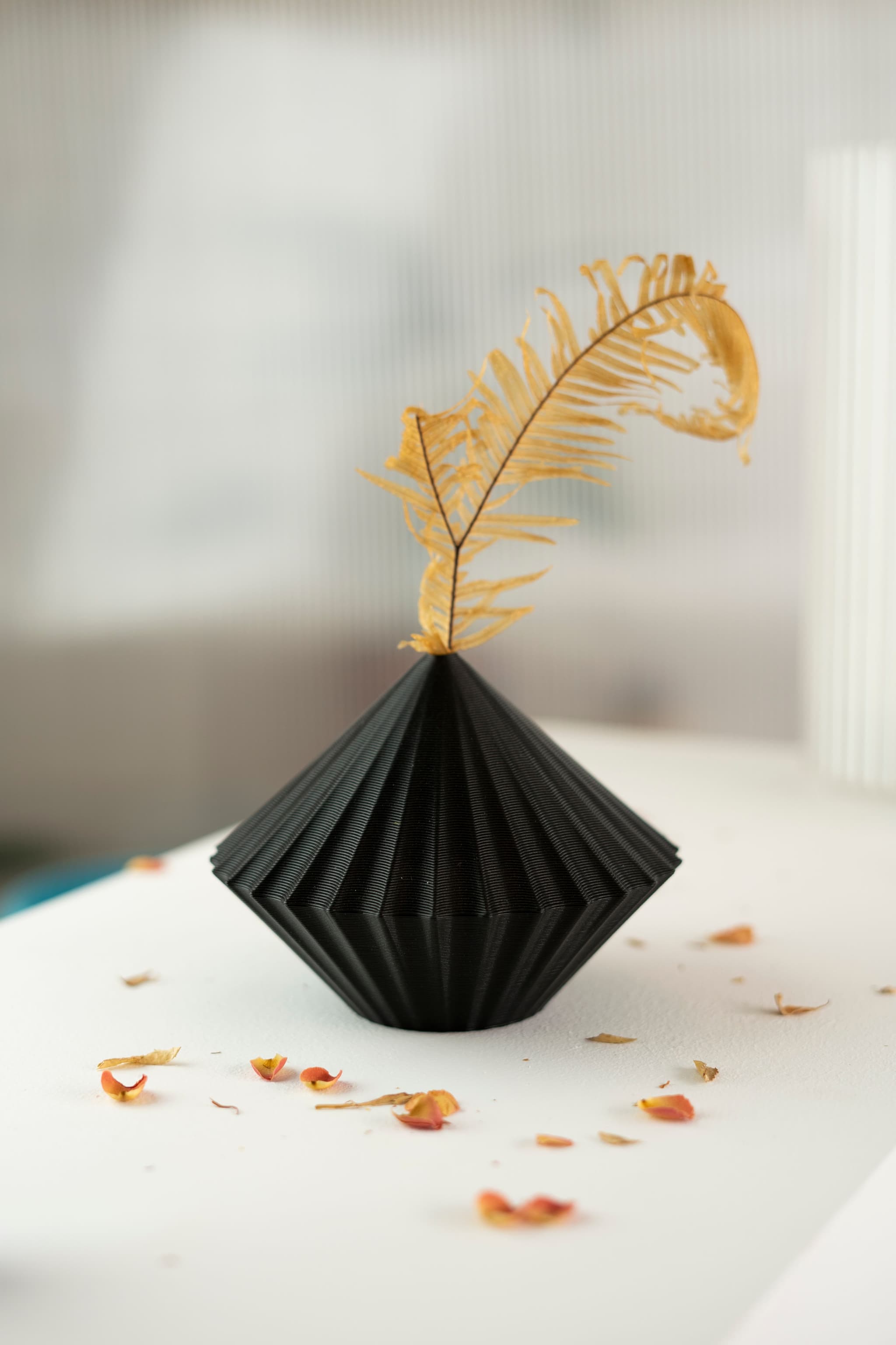Lucent Lines 3D printed vase is a flower vase made from recycled plastic bottles (PETG) (Photo credit: @EveryOtherDay)