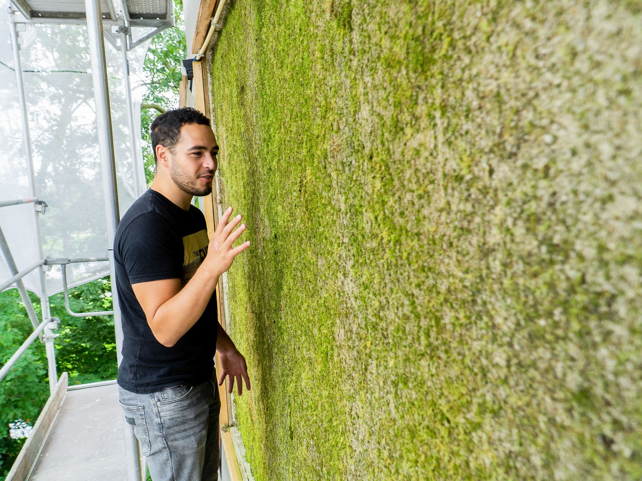 Co-founder Adil Aarouss with moss wall Citer Pilot