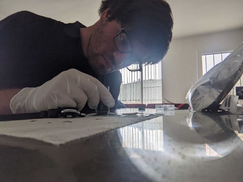 An action-shot in Spira’s lab environment, capturing Roth during a pigment-development session