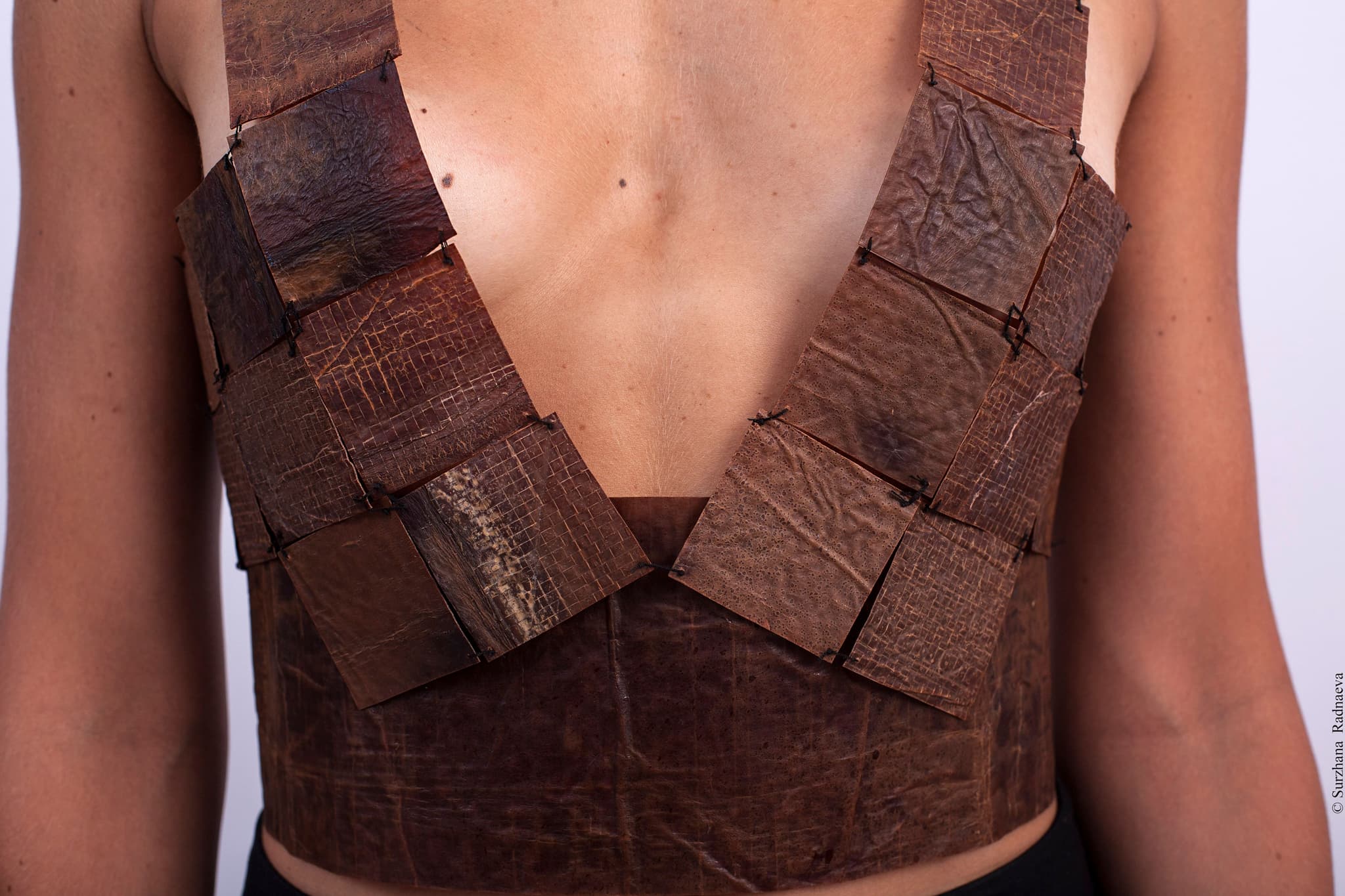 Bacterial-dyed Buryat dress: front with Shibori traces; detail of dye diffusion