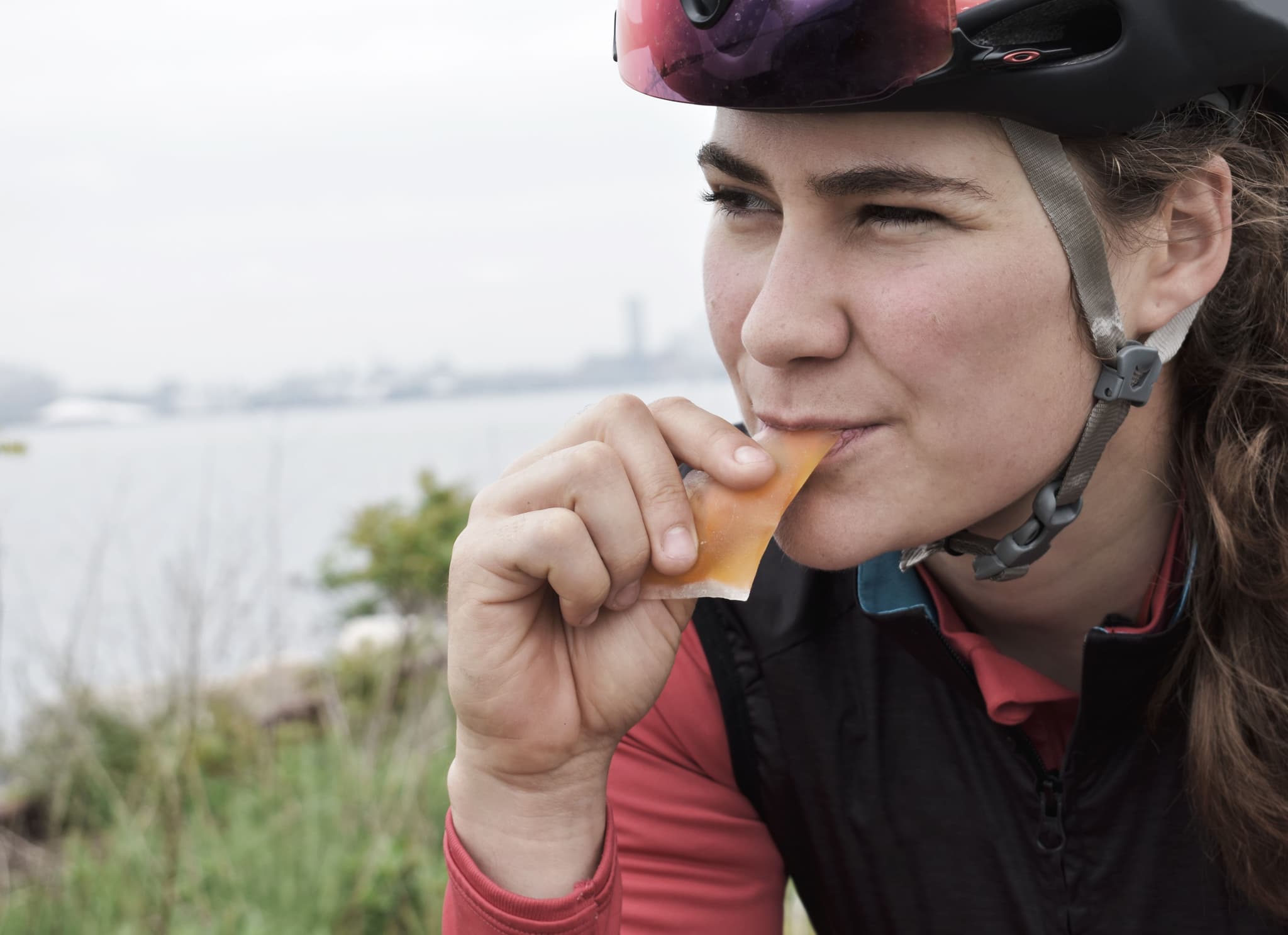 Cyclist Dani Morsehead eating a “Gone” gel