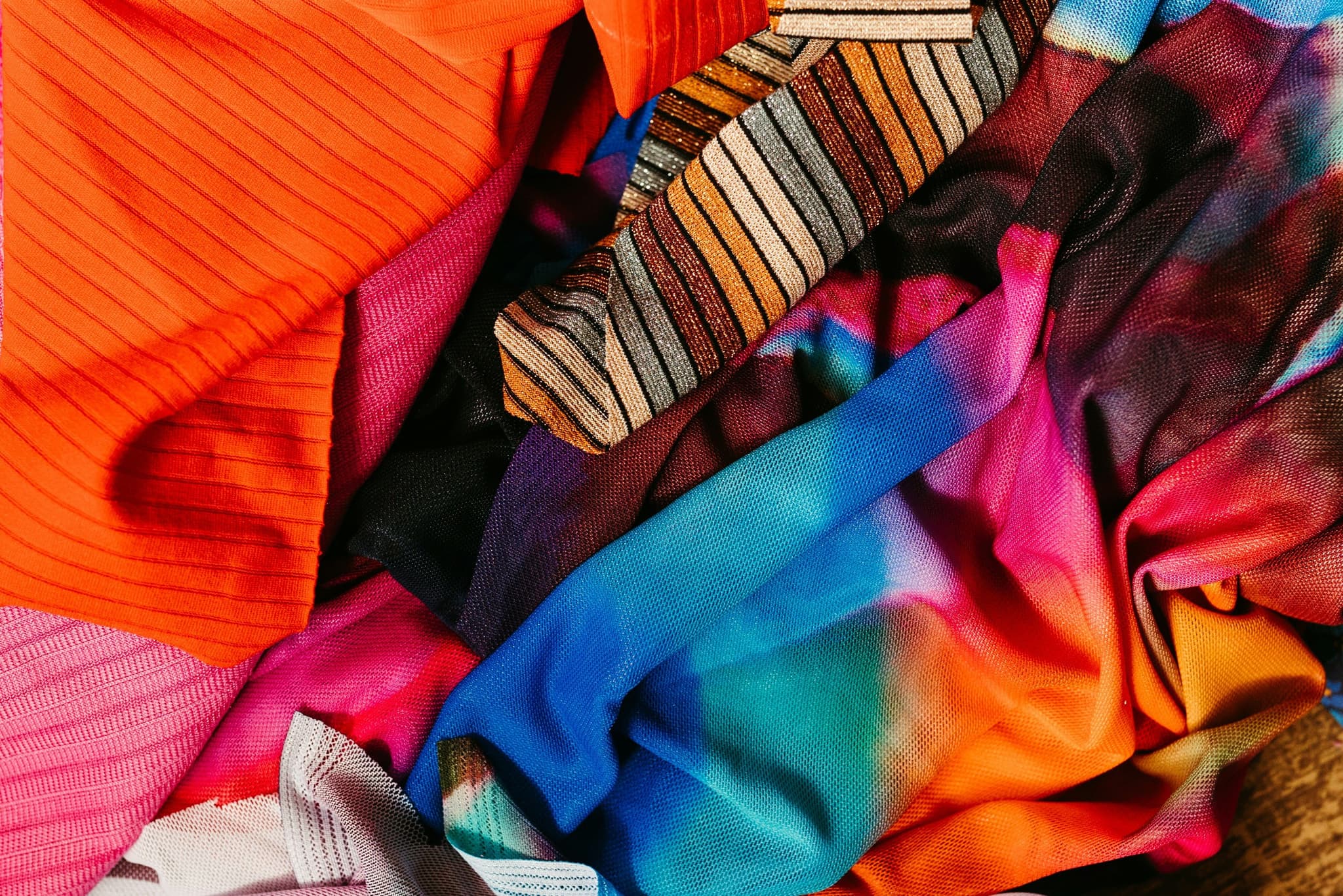 New fibers comparable to polyester are coming out, but scaling is a huge challenge that might need a long time.